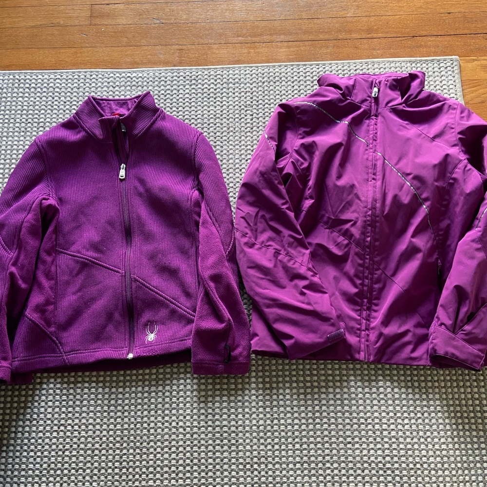 Spyder Ski jacket with hood and inside fleece layer. Youth size 14.